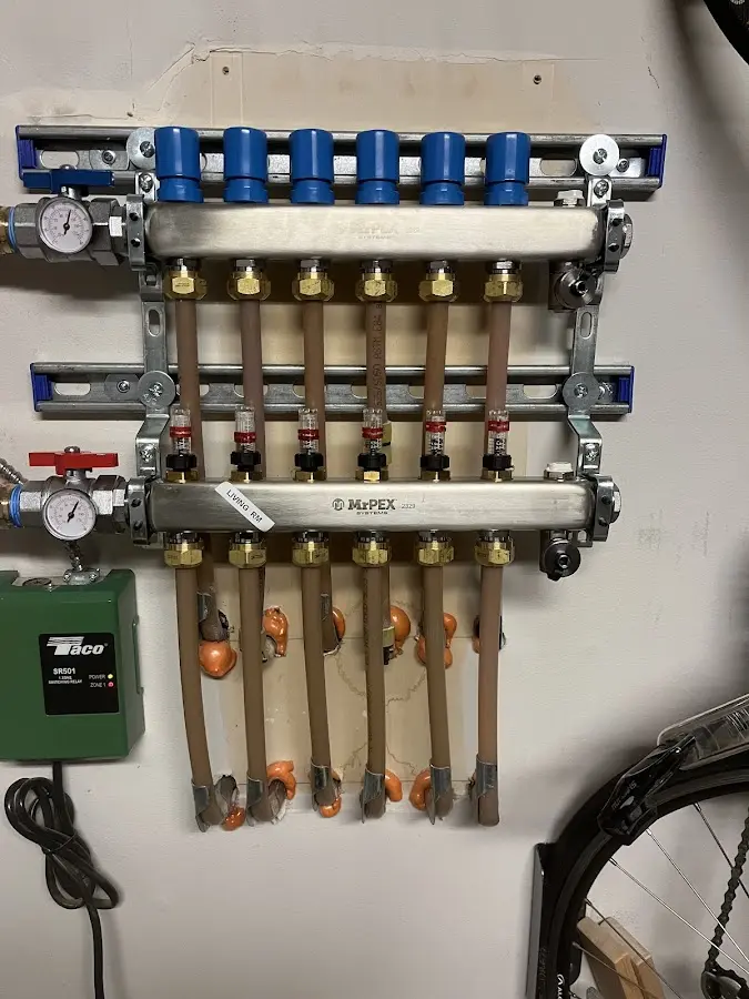 Plumber performing Gas Line Installation at a residential property in Gilmer